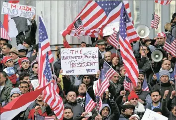  ?? PICTURE: AP ?? Muslims and Yemenis gather with their supporters on the steps of Brooklyn’s Borough Hall, during a protest against US President Donald Trump’s temporary ban on Muslims from certain countries entering the United States, in the Brooklyn borough of New...