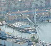  ?? Ansa ?? Cuore della città Un’immagine del porto antico di Genova. In basso, l’articolo del “Fatto”