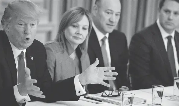  ?? BRENDAN SMIALOWSKI/AFP/GETTY IMAGES FILES ?? U.S. President Donald Trump speaks before a now-disbanded policy and strategy forum in February, including executives such as General Motors CEO Mary Barra, second left, and Walmart CEO Doug McMillon, right. The chaos in the White House is seen to...