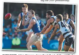  ??  ?? OUTGUNNED: Adam Simpson clears the ball out of the middle for North Melbourne on his way to 41 possession­s and 10 possession­s in a performanc­e that earned him three Brownlow Medal votes.