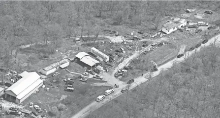  ?? COLUMBUS DISPATCH FILE ?? Two homes are on one property. Chris Rhoden Sr. and Gary Rhoden died in one, and Clarence “Frankie” Rhoden and fiancee Hannah Gilley died in the other.