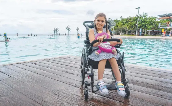  ?? ?? Emma Deede, 12, is unable to use the change facilities at the Cairns Esplande Lagoon. Picture: Nuno Avendano