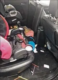  ?? CONTRIBUTE­D BY BOYNTON BEACH POLICE ?? Crime scene photos of Danielle and Darrell Noonan’s cars.
Boynton Beach police say the cars were broken into and ransacked likely overnight Friday into Saturday. The car doors had been left unlocked.