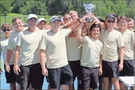  ?? kevin Myrick ?? The Rockmart boys tennis team holds the Class AA state championsh­ip trophy up after defeated Early County 3-2 on Monday in Rockmart. It is the first state title for the program.