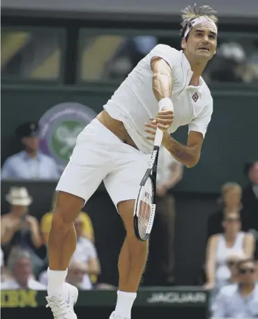  ?? PICTURE: GETTY IMAGES ?? Roger Federer took care of Adrian Mannarino at Wimbledon.