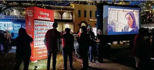  ?? Courtesy ?? The Texas Giving Machine takes donations to equip apartments for Afghan refugees being resettled in the San Antonio area. The machine was set up for the Sip n’ Stroll event in Seguin.