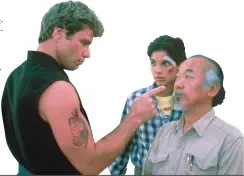  ??  ?? Martin Kove, Ralph Macchio and Pat Morita in “The Karate Kid.”