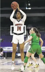  ?? Elsa / Getty Images ?? Louisville guard Kianna Smith, shown against Oregon on Sunday, is averaging 11.5 points per game this season.