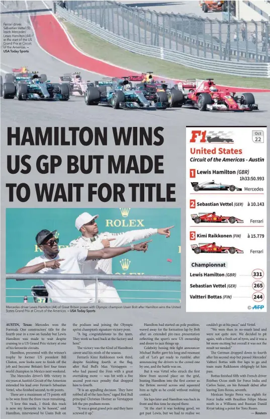  ?? — USA Today Sports — USA Today Sports ?? Ferrari driver Sebastian Vettel (5) leads Mercedes’ Lewis Hamilton (44) at the start of the US Grand Prix at Circuit of the Americas. Mercedes driver Lewis Hamilton (44) of Great Britain poses with Olympic champion Usain Bolt after Hamilton wins the United States Grand Prix at Circuit of the Americas.