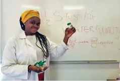  ?? Photo: Supplied ?? Thandiswa Nqowana of Rhodes Pharmacy Department with one of the DIY Water Testing Kits for kids.