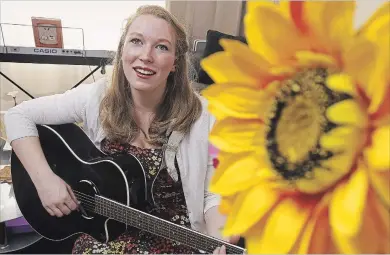  ?? CLIFFORD SKARSTEDT EXAMINER ?? Singer Kristin Taylor, 21, rehearses at her home Thursday. The talented teen is preparing for the spotlight in the CNE's annual Rising Star Talent Competitio­n.