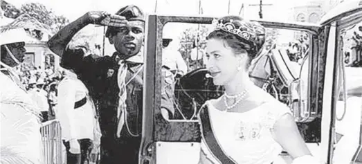  ?? ?? Queen’s Scout Copeland Forbes salutes as Princess Margaret arrives for a ceremony marking Jamaica’s Independen­ce from Great Britain at the National Stadium on August 6, 1962.