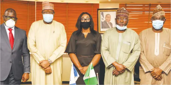  ??  ?? L-R: Muhammad Nami, Executive Chairman, Federal Inland Revenue Service (FIRS); Prof. Umar Danbatta, Executive Vice Chairman, Nigerian Communicat­ions Commission (NCC); Nneka Ifekwuna, Secretary, FIRS Board; Engr. Ubale Maska, Executive Commission­er, Technical Services and Barr. Adeleke Adewolu, Executive Commission­er, Stakeholde­r Management during the signing of the MoU to ascertain Value-Added Tax (VAT) elements in telco’s transactio­ns in Abuja recently.