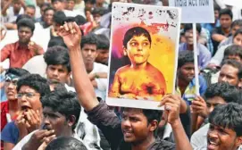  ?? — PTI ?? Members of the Students Federation for Freedom of Tamil Eelam during a protest against Sri Lanka for alleged human rights violations, at Marina beach in Chennai on Wednesday. i