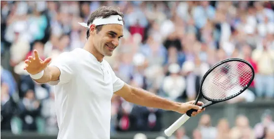  ?? GARETH FULLER/AFP/ GETTY IMAGES ?? Swiss tennis legend Roger Federer celebrates after beating Tomas Berdych in their Wimbledon semifinal in London on Friday. He will make his 29th appearance in a Grand Slam final and 11th appearance in a Wimbledon final, extending two records he holds....