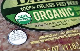  ?? STEVEN SENNE / AP 2018 ?? Labels such as “Fair Trade Certified” or “USDA Organic “signify that a product’s supply chain has gone through some level of vetting. However, standards can vary widely. “It’s not that those labels are meaningles­s, it’s that their meaning has been watered down,” says Dr. Ellis Jones, author of “The Better World Shopping Guide.”