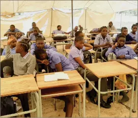  ?? Photo: Festus Hamalwa ?? Tent… Grade nine learners at the Imbili Combined School are being taught in a tent.