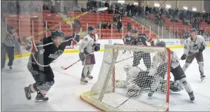  ?? CHRISTIAN ROACH/CAPE BRETON POST ?? The Junior Miners’ Tristan Nordine celebrates after scoring the game-tying goal during Game 4 of his team’s Nova Scotia Junior Hockey League playoff series against the Strait Pirates at the Membertou Sport and Wellness Centre on Saturday. Nordine would...