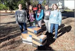  ?? / Contribute­d ?? Local youth donated several boxes worth of pull tabs to contribute to annual donations 4-H makes to charity.