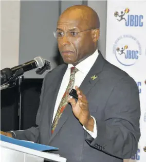  ?? ?? Minister of Industry, Investment, & Commerce Aubyn Hill makes his remarks at the ‘Breakfast with the CEO’ round-table talks at the AC Hotel in Kingston on Thursday, April 4, 2024.