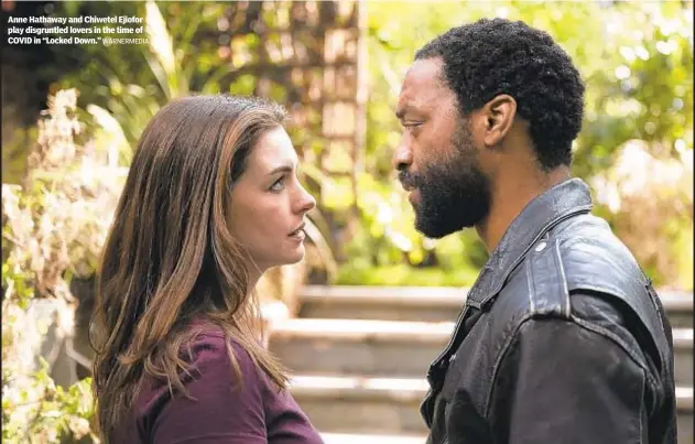  ?? WARNERMEDI­A ?? Anne Hathaway and Chiwetel Ejiofor play disgruntle­d lovers in the time of COVID in “Locked Down.”