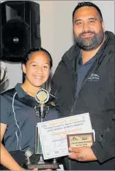  ??  ?? Tangiariki Wanikau of Tu¯rangi Karate Club was awarded Junior Sportspers­on of the Year. She is pictured with Aaron Moeke of Tuwharetoa FM.