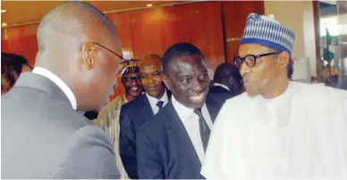  ??  ?? From left: Chief Executive Officer, Stanbic IBTC
Capital, Mr. Funsho Akerele; Chairman Nigerian Economic summit Group, Mr. Asue Ighodalo; and President Muhammadu Buhari, during the 25th Nigerian Economic Summit in Abuja yesterday