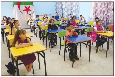  ?? (File Photo/AP) ?? Schoolchil­dren attend a class Sept. 19 in the Ben Omar district.