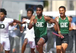  ?? PHOTO BY ANDY HOLZMAN ?? Dijon Stanley of Granada Hills Charter competes in 4x100relay at the City Section finals.