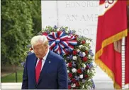  ?? ALEX BRANDON / ASSOCIATED PRESS ?? President Donald Trump turns after placing a wreath at the Tomb of the Unknown Soldier in Arlington National Cemetery, in honor of Memorial Day, Monday, in Arlington, Virginia.