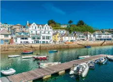  ??  ?? Picturesqu­e harbour front at St Mawes is understand­ably popular with visitors – so it can get busy