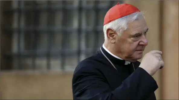  ?? PHOTO/GREGORIO BORGIA ?? Cardinal Gerhard Ludwig Mueller arrives for a morning session of a two-week synod on family issues at the Vatican on Oct. 14, 2014. Pope Francis has declined to renew the mandate of the Vatican’s conservati­ve doctrine chief, tapping instead the No. 2...