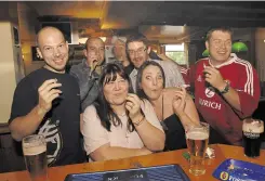  ?? Picture: Nick Johnson ?? Punters at Ye Old Leather Bottle in Dover Road, Northfleet, on June 30, 2007, making the most of the last day before the smoking ban in pubs