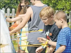  ??  ?? This is healthy: Archery at a summer camp in the time before coronaviru­s — a respite for kids and parents alike Gov. Cuomo refuses to grant.