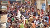  ?? PTI ?? Stranded migrant workers wait for packaged food, distribute­d by Central Reserve Police Force (CRPF), during the nationwide lockdown in the wake of coronaviru­s pandemic, in Chennai on Wednesday