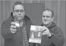  ?? LAWRENCE POWELL ?? Annapolis County Ground Search and Rescue president Marc Sproule, left, and search director Kent Moluneaux hold up one of the new Garmin Gpsmap 64s units and map software they just bought with the help of the province’s Emergency Service Provider Fund.