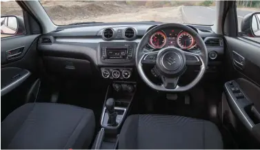  ??  ?? Top: Being lighter, the new Swift feels a lot peppier than before. Above: Cabin quality is leagues ahead of the old car. Below: Neatly integrated door handle on the C pillar isn't an original idea but well executed