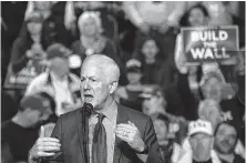 ?? Adria Malcolm / Bloomberg ?? Sen. John Cornyn praised President Trump for “speaking the truth” about border problems at a rally Monday in El Paso.