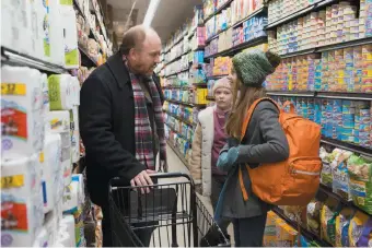  ??  ?? Louis C.K. as Louie and Ursula Parker and Hadley Delany as his daughters Jane and Lilly in season 5 of Louie, 2015