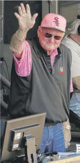  ?? NAM Y. HUH/AP ?? Legendary White Sox announcer Ken “Hawk” Harrelson waves to fans during the seventh inning of his farewell broadcast.