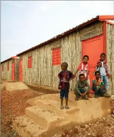  ?? Photo: Nampa/AFP ?? Displaced children… Ethiopian refugees who fled the fighting in the Tigray region gather in front of a newlybuilt home at Umm Rakuba camp in eastern Sudan’s Gedaref State.