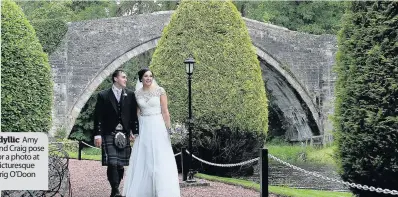  ??  ?? Idyllic Amy and Craig pose for a photo at picturesqu­e Brig O’Doon