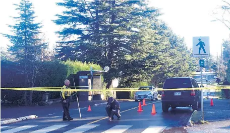  ??  ?? A crosswalk at Ash Road and Torquay Drive in Saanich, where a young girl was struck by an SUV about 8:15 a.m. Wednesday.