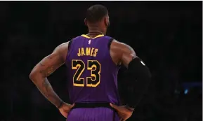  ?? (Kirby Lee/USA TODAY Sports) ?? LOS ANGELES LAKERS forward LeBron James stands on the court in the fourth quarter against the Portland Trail Blazers Wednesday night.