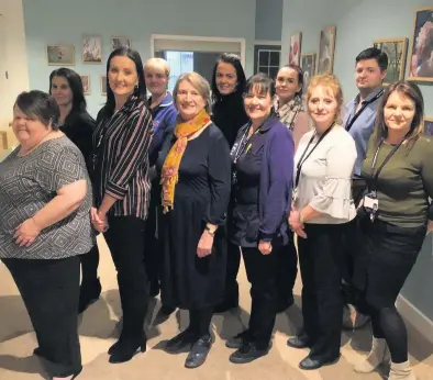  ??  ?? County councillor Jane Tremlett, executive board member for health and social care, meets staff who have transferre­d from Allied Healthcare to Carmarthen­shire Council.