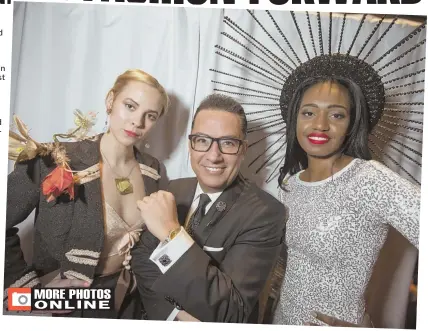  ?? STAFF PHOTO BY NICOLAUS CZARNECKI ?? Models Logan Gilbert, far left, and Gyesla Jean, far right, pose with Herald Managing Editor/Creative Gustavo Leon last night. Gilbert is wearing Martha Jackson while Jean is wearing Casa De Angelina.