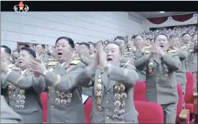  ?? — THE ASSOCIATED PRESS ?? Military officers applaud during the party congress in Pyongyang, North Korea, on Saturday. The event confirmed Kim Jong Un is firmly in control of the Workers’ Party.