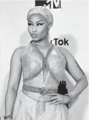  ?? ANDER GILLENEA /GETTY-AFP 2018 ?? Nicki Minaj, above, sampled a 1988 Tracy Chapman song in her 2018 tune “Sorry.”