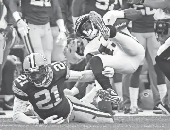  ?? BENNY SIEU / USA TODAY SPORTS ?? Safety Ha Ha Clinton-Dix — ranked No. 5 on the Packers roster —makes a tackle on Philadelph­ia Eagles wide receiver Nelson Agholor in the a preseason game at Lambeau Field.