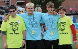  ?? Scott herpst ?? Ringgold High athletes Leo Mills (left) and Chase Sholtz (right) spent the day competing and hanging out with their buddies Cooper Sexton and Gage Keener.